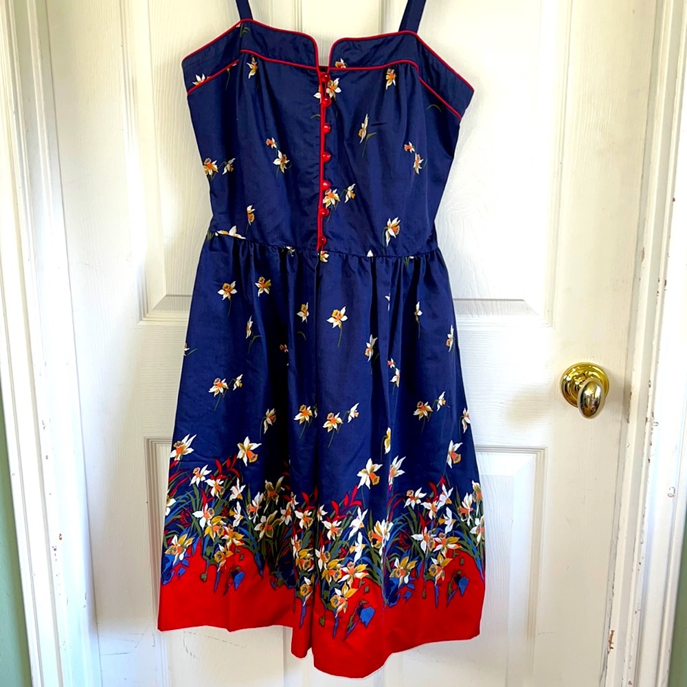 Vintage 1980s sun dress.  Dark blue with red flowers & red piping & buttons.
